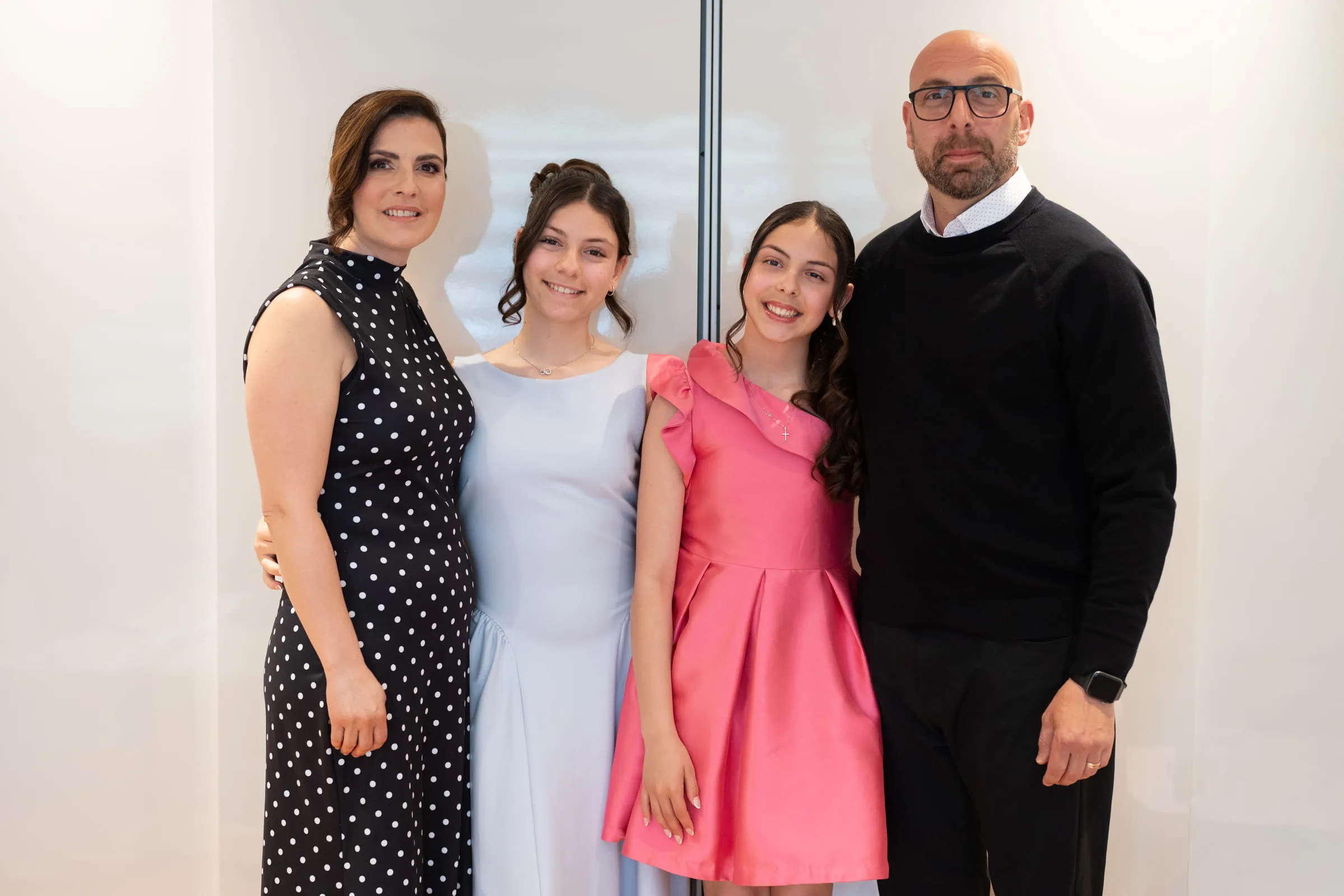 The family of four together before leaving for the church